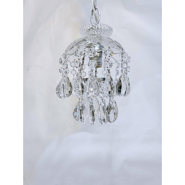 Dome layered chandelier with cut glass dish, octagon chain and 30% leaded Swedish cuts crystal drops. It rewired and it...