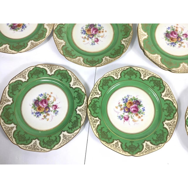 A set of ten hand-painted dinner plates by Tirschenreuth P.T .
