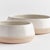 In the perfect shade of warmWhite and finished in a crackle glaze, this set of bowls adds a subtle sophistication to any...