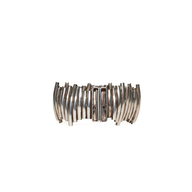 This wonderful vintage 1960's sculptural modernist sterling silver cuff bracelet is very well made. So very chic on your...