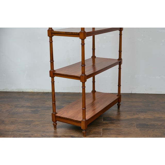 An English regency period pine freestanding étagère from the early 19th century with four shelves, turned supports and...