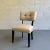 Mid-Century Modern, slipper side chair features a black lacquered maple frame with woven, cotton linen upholstery and...