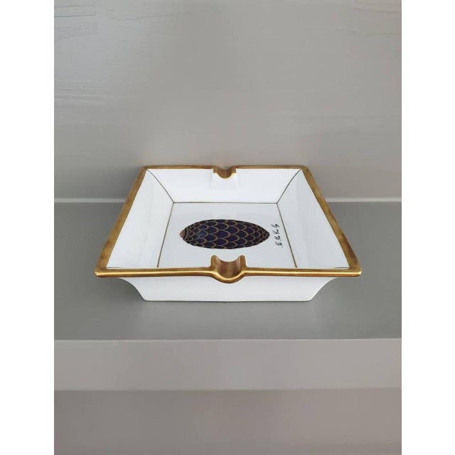 A rare and stunning Fabergé Limoges French porcelain hand painted parcel gilt tray. Created exclusively by House of...