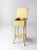 This charming antique painted bamboo side table features a soft pastel yellow finish over woven grasscloth and bamboo....