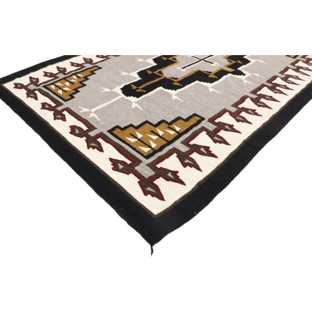 77770 Vintage Klagetoh Navajo-Style Kilim Rug, 04'06 x 07'02. This handwoven wool vintage Klagetoh Navajo-style kilim is a...