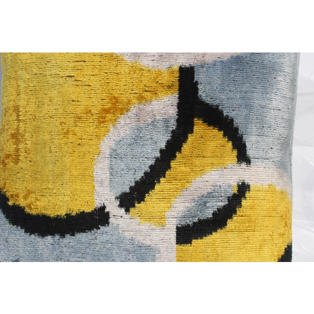 Bohemian silk velvet ikat pillow with vibrant colors of Silver / yellow/black beige and Gray Super hand soft. Pillow has a...