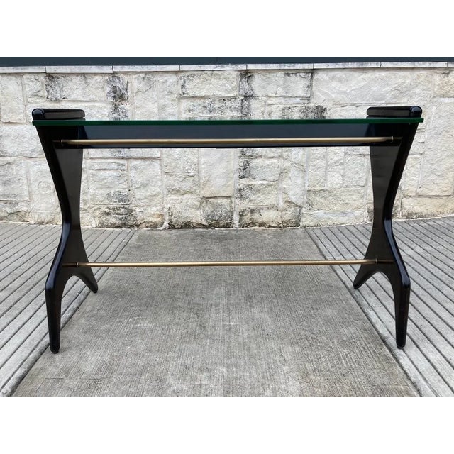 Keno Bros Theodore Alexander Ebonized Wood Writing Desk. This desk is part of the Keno Bros Collection at Theodore Alexander.