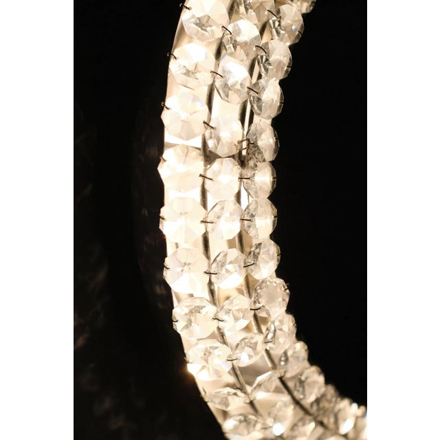 Love this little mirror. Nickel base surrounded with crystals. And back lidded by 4 small fitting bulbs, gives a wonderful...