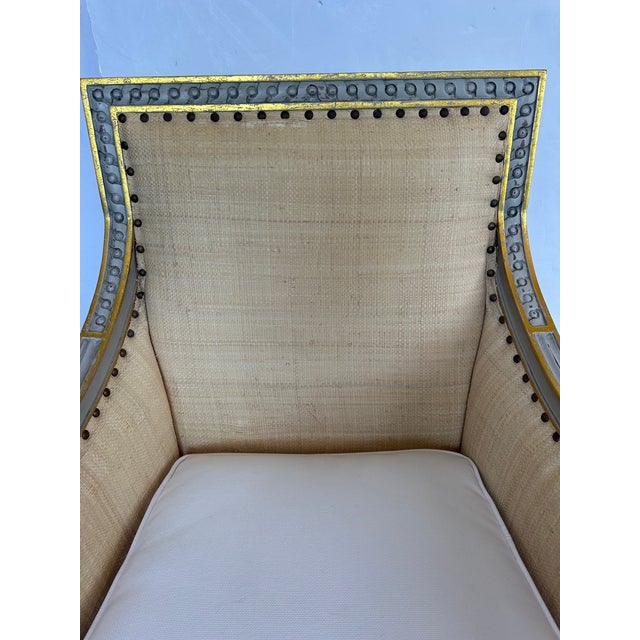 Hannah lounge club chair by Oly Studio having new soft white cushion, natural raffia and beautiful French grey finish with...