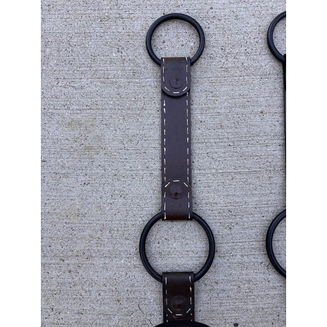 Very nice set of rustic candle sconces with an equestrian flair made to resemble a bridle but crafted completely of metal....