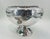 An exceptional and rare large-scale silver-plated punch bowl by celebrated Mexican designer Emilia Castillo, handcrafted...