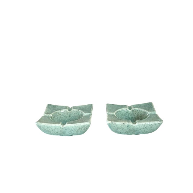 Matched pair of vintage 1960’s ceramic speckled light green or turquoise chunky ashtrays.
