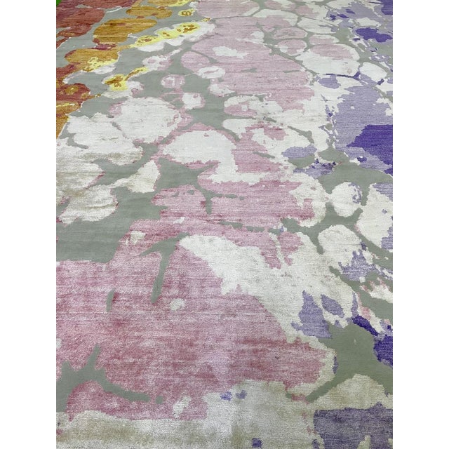 Beautiful hand knotted modern and fashionable collection of borderless designs rug, made of 75% wool and 25% cotton in...