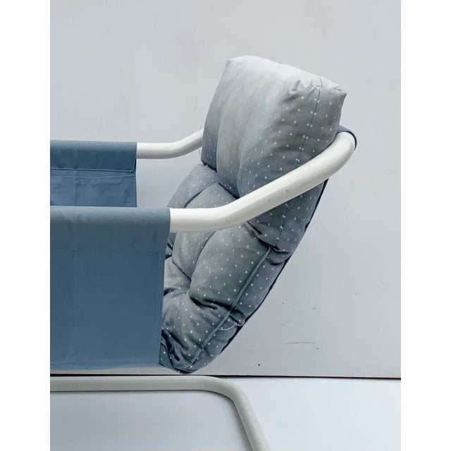 Crafted in Sweden and reminiscent of the vibrant 1970s era, this Mio armchair is a nod to retro design with a modern...