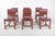 Six chairs with brown leather backs and seats. The chairs are simple but elegant in style, with metal nails decorating and...