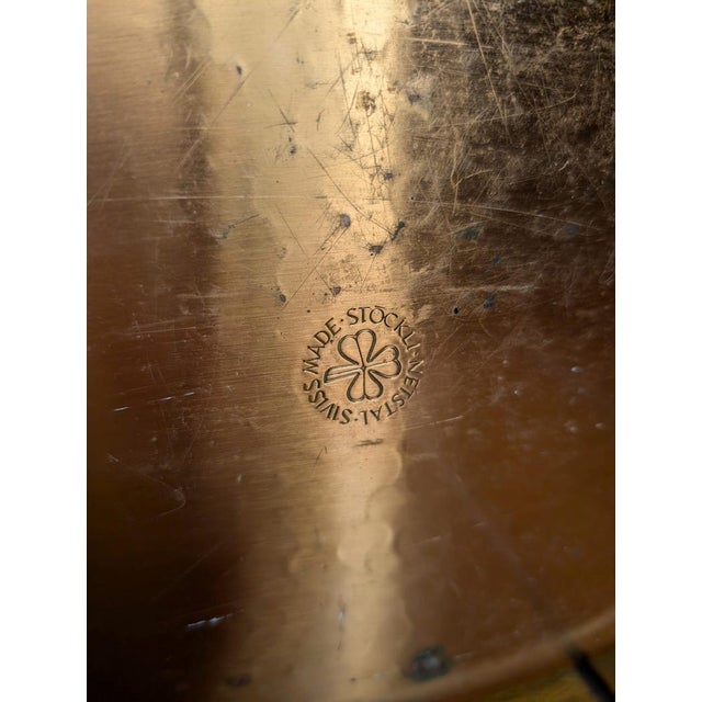 The Stoeckli Swiss vintage large copper cooker pot, or Poissonnière, is designed for cooking whole fish and features...