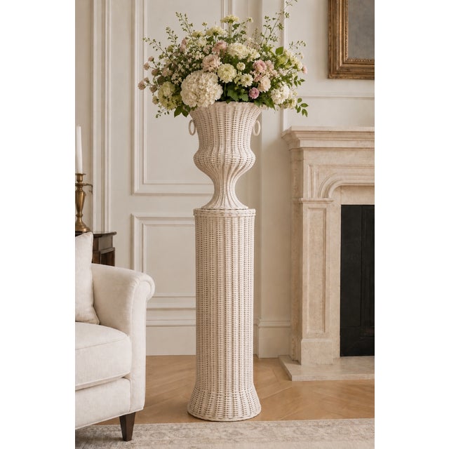 Showcase your favorite decor with our White Round Wicker Pedestal. Crafted from high-quality natural wicker, this pedestal...