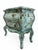 A beautifully hand-finished French Provincial bombé chest in a distressed Mediterranean green patina. The sculptural...
