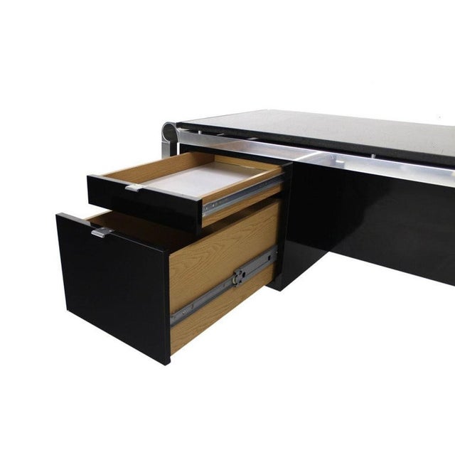 High quality mid century modern black granite desk with shelf or bookcase in the back.