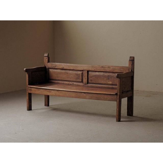 19th-century mountain bench from Catalonia, It is crafted from solid softwood using traditional mortise-and-tenon joinery....
