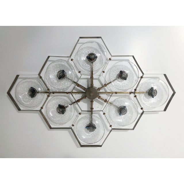 Italian midcentury flush mount with eight clear Murano glass shades carefully hand blown with bubbles inside the glass...