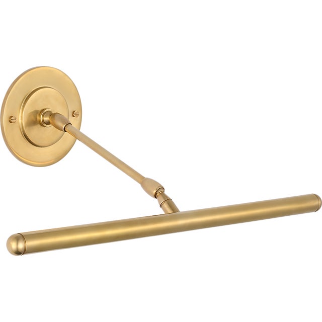 Emery 18" Picture Light in Hand-Rubbed Antique Brass Designer: Amber Lewis Finish: Hand-Rubbed Antique Brass Height: 4.5"...