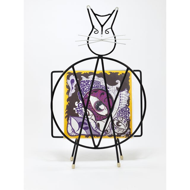 Sculptural Italian Mid-Century cat shaped wire newspaper stand / magazine rack / record holder from the 1950s. Handmade of...