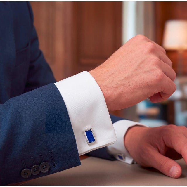 A superb pair of Modernist 18ct white gold and lapis lazuli cufflinks. Stamped 750 along with maker's mark 'R'. Circa...