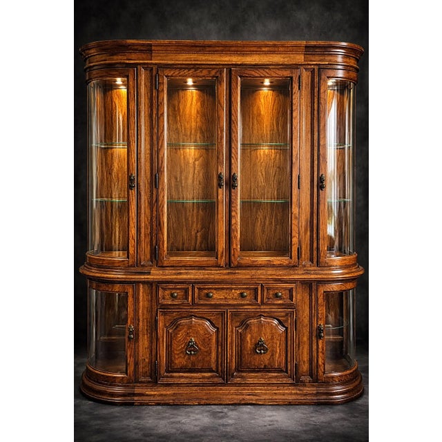 Large Mid-20th Century Colonial Revival Oak China Cabinet With Curved Glass Display Ends & Interior Lighting — Two-Piece Hutch For Sale - Image 4 of 11