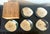 A set of five Japanese ceramic dishes in an inscribed tomobako box. These dishes were made in the types of Ko-Oribe (Old-...