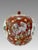 A seldom found brick red porcelain oviform Chinese ginger jar made in the city of Hong Kong in the middle of the last...