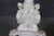Make a dramatic statement with this exceptional pair of white figural marble pedestals, masterfully sculpted to bring...