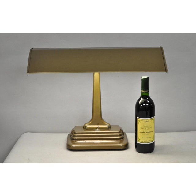 Vintage Mid Century Modern Art Deco Metal Bronze Finish Bankers Table Desk Lamp. Circa Mid 20th Century. Measurements: 16"...