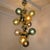 Large Mid Century Modern glass balls and brass chandelier or pendant light, Italy circa 2000s. The chandelier is made of...