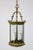 An Italian, Neoclassical, 6-sided lantern with thick, beveled glass. Composed of heavy bronze and brass, with pagoda-esque...