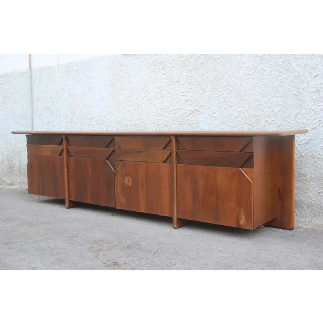 This large walnut sideboard was designed by Ammanati & Vitelli for Catalano in the 1960s. I have official proof of...