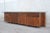 This large walnut sideboard was designed by Ammanati & Vitelli for Catalano in the 1960s. I have official proof of...