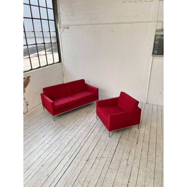 This beautiful seating group, consisting of a sofa (model 1206c) and an armchair (model 1205c), was designed by florence...