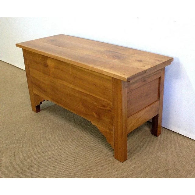 North Loire regional chest in solid cherry opening with a 3-board top. He features two boards out of two slightly cut...