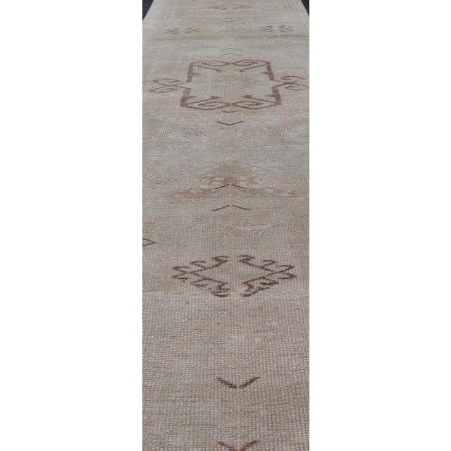Early 20th Century Vintage Turkish Oushak Runner With Soft Pastel Tones and Stylized Geometric Moti 2'1 X 12'8 For Sale - Image 5 of 11