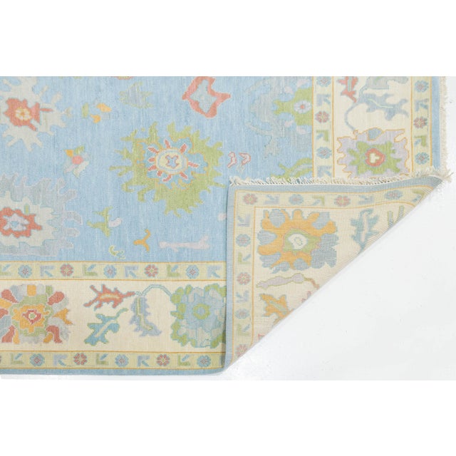Enhance your space with this stunning Modern Oushak style wool rug, combining traditional Turkish artistry with...