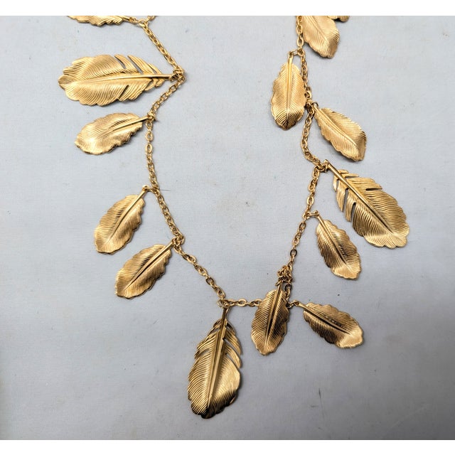 Vintage 1982 Signed Napier Goldtone Feather Charm Necklace For Sale - Image 11 of 14
