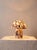 A sculptural mushroom-form table lamp hand-carved from solid Calacatta Viola marble, a rare Italian stone prized for its...