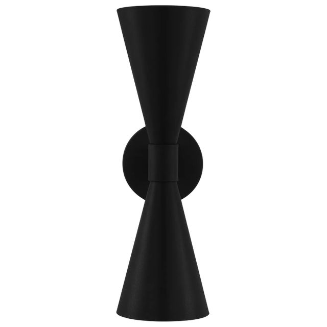 The Albertine chandelier by AERIN for Visual Comfort Studio Collection emits ample light above and below from eight...