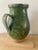 This is a lovely faience jug, great green color and patina