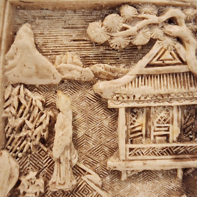 An exquisite miniature for the discerning collector. This vintage Chinese snuff bottle is carved from natural ox bone,...