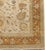 All over floral pattern on beige field. Wool pile on cotton foundation. Handmade. 9'9"x 8'