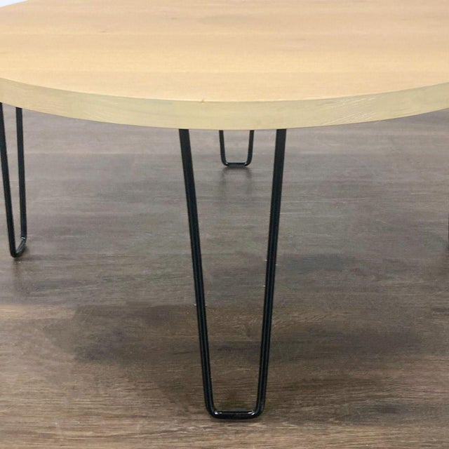 Wood top on wire hairpin legs. Original Price: $160. Dimensions (in): 36W x 36D x 19H.