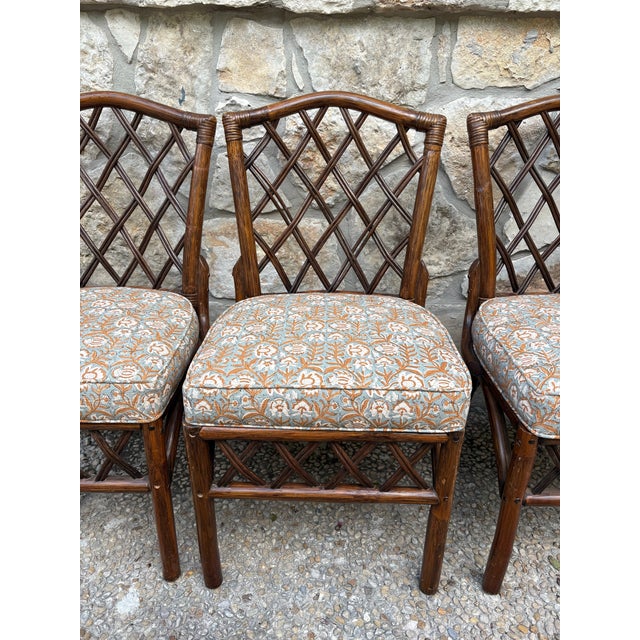 This set is newly upholstered in a long lasting block print, duck canvas fabric. **There is a matching pair of Arm Chairs...