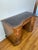 Antique English kidney-shaped women's writing desk from the Victorian era. A dark leather writing surface with gold-tooled...